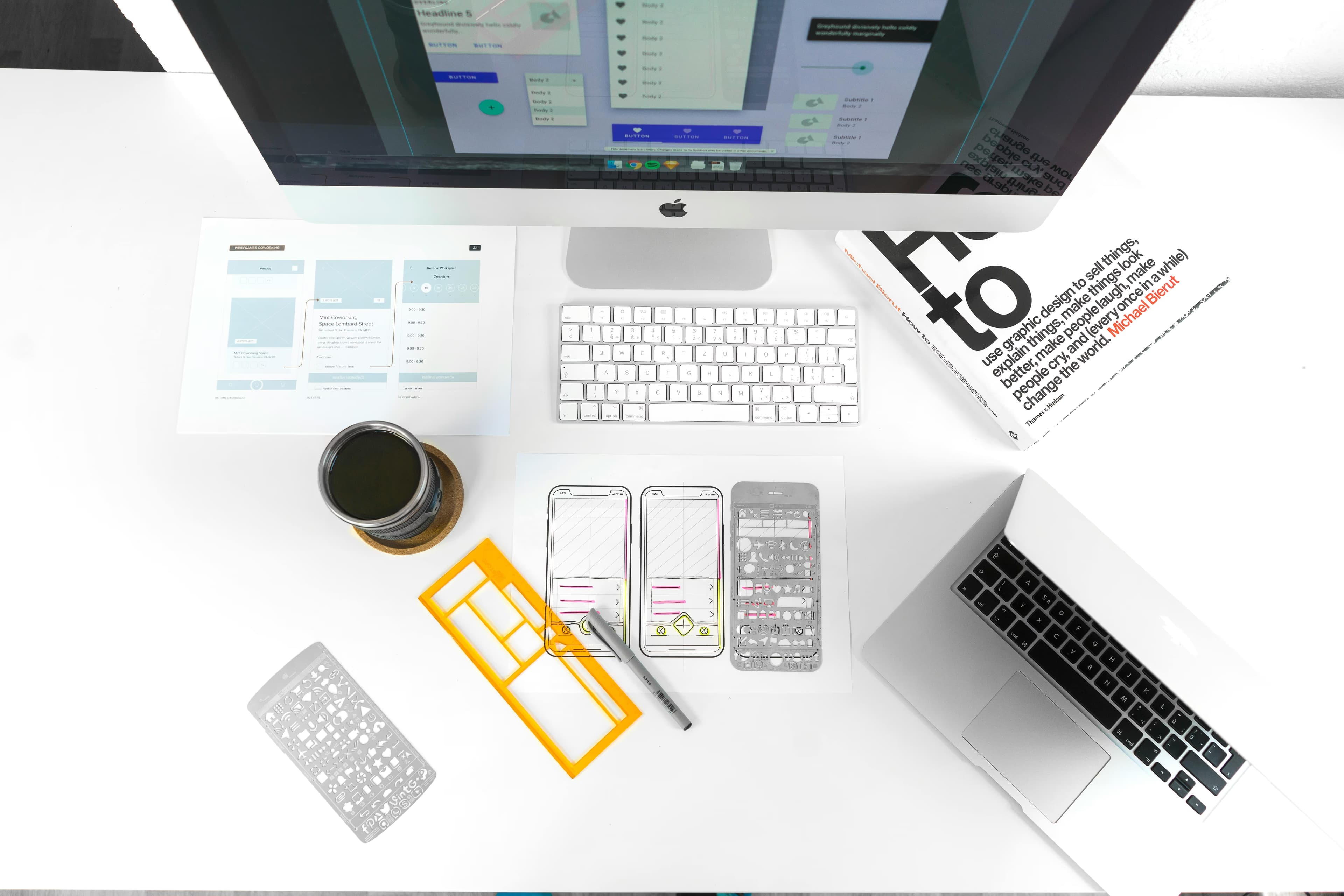 Sketches and books near a Mac — web design aesthetic